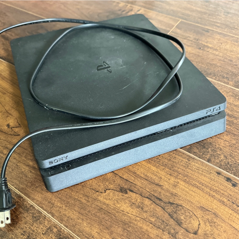 Sony PlayStation 4 with Disc Drive and 500GB